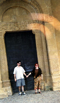 Georg and Sarah in front of the romanesque church